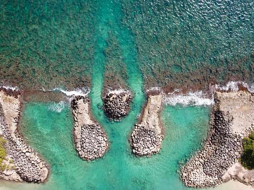 ko olina resort aerial photography of shore and rocks at daytime kapolei